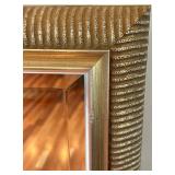 Elegant Wall Mirror with Gold Ribbed Frame