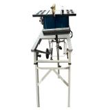 Ryobi 10" BTS10 Table Saw on Ridgid Portable Work Table with Wheels