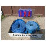 Flat of collapsible water hoses. Approx 25