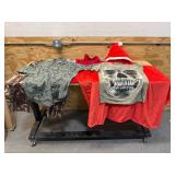 Bin of shirts, pants, belts, socks