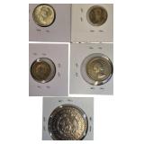 Five silver world coins from different denominations and countries in very nice condition.
