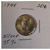 Five silver world coins from different denominations and countries in very nice condition.