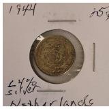 Five silver world coins from different denominations and countries in very nice condition.