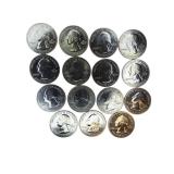 Fifteen uncirculated proof ATB quarters from different years.