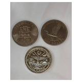 Three large commemorative world coins in nice condition, from different countries.
