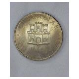 Three large commemorative world coins in nice condition, from different countries.