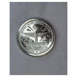 Three large commemorative world coins in nice condition, from different countries.