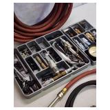 Assortment of Air Tool Accessories and Hose