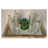 Vintage Gold Mirror with Glass Bottle Collection
