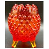 Fenton Amberina Hobnail Three Footed Egg, L.E. Smith Amberina Grape & Leaf Pattern Water Glass, and Jeanette Glass Covered Candy Dish