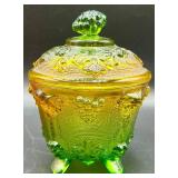 Fenton Amberina Hobnail Three Footed Egg, L.E. Smith Amberina Grape & Leaf Pattern Water Glass, and Jeanette Glass Covered Candy Dish