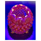 Fenton Amberina Hobnail Three Footed Egg, L.E. Smith Amberina Grape & Leaf Pattern Water Glass, and Jeanette Glass Covered Candy Dish