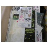 Variety of note pads, scissors and ...