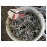 Milk crates and buckets containing ...