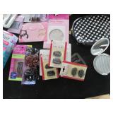 Cosmetic bags, hair accessories, or...