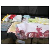 Variety of rugs, blankets, window c...