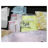 Variety of rugs, blankets, window c...