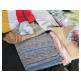 Variety of rugs, blankets, window c...