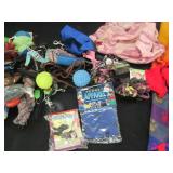 Pet harnesses, toys, clothing and o...
