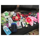 Pet clothing, toys, training suppli...