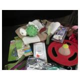 Pet clothing, toys, training suppli...