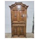 Antique Wooden Armoire with Brass Accents and Drawers