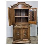 Antique Wooden Armoire with Brass Accents and Drawers
