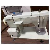 Vintage Signature Sewing Machine with Integrated Wood Cabinet