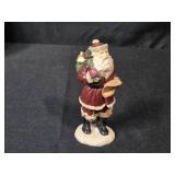 Holiday Figurine Collection with Snowman, Santa, and Cardinals