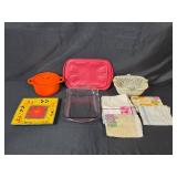 Assorted Kitchenware Collection with Ceramic Pot, Plate, and Woven Basket