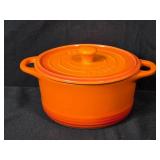 Assorted Kitchenware Collection with Ceramic Pot, Plate, and Woven Basket