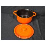 Assorted Kitchenware Collection with Ceramic Pot, Plate, and Woven Basket