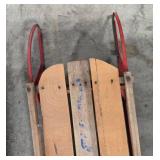 Vintage Wooden Snow Sled with Red Metal Runners