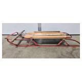 Vintage Wooden Snow Sled with Red Metal Runners