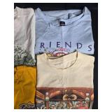 Collection of Mixed Graphic T-Shirts and Denim Skirt