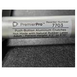 Assorted Mobility Aids: Foldable Walker, Crutches, and Cane