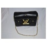 Louis Vuitton Quilted Twist MM Bag