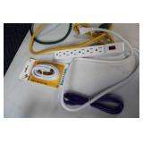 Collection of Power Strips, Extension Cables, and Coaxial Cable