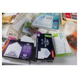 Assorted Office Supplies Including Envelopes, File Folders, and More