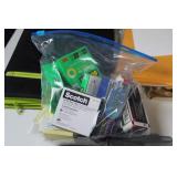 Assorted Office Supplies Including Envelopes, File Folders, and More