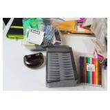 Assorted Office Supplies Including Envelopes, File Folders, and More