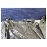 Set of 2 Military Surplus Olive Green Rain Ponchos with Woodland Pattern seat cushion / life preserver.