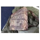 Set of 2 Military Surplus Olive Green Rain Ponchos with Woodland Pattern seat cushion / life preserver.