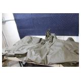 Set of 2 Military Surplus Olive Green Rain Ponchos with Woodland Pattern seat cushion / life preserver.