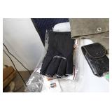 Assorted Outdoor Gear with Jackets, Gloves, and Accessories