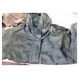 Assorted Outdoor Gear with Jackets, Gloves, and Accessories