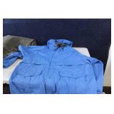 Assorted Outdoor Gear with Jackets, Gloves, and Accessories