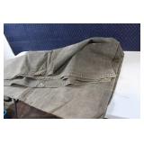 Assorted Outdoor Gear with Jackets, Gloves, and Accessories