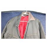 Used Insulated Coverall with Red Lining and Patch Repair