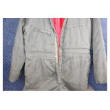 Used Insulated Coverall with Red Lining and Patch Repair